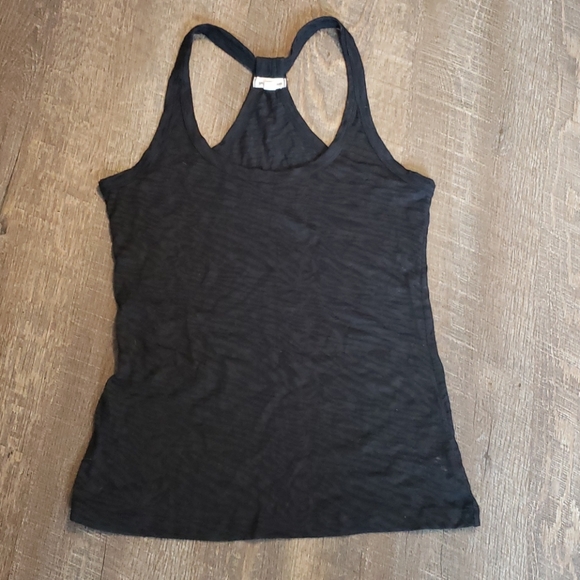 Zenana Outfitters Tops - Black zebra material racer back tank. Large